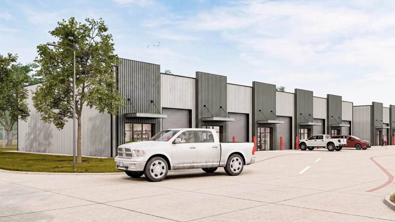 Bammel Phase 1 render — oblique driveway view of flex office warehouse suites, curb appeal angle, NW Houston TX 77066